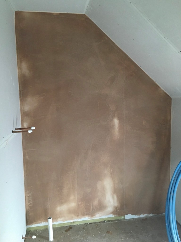 The beginnings of the plastering!