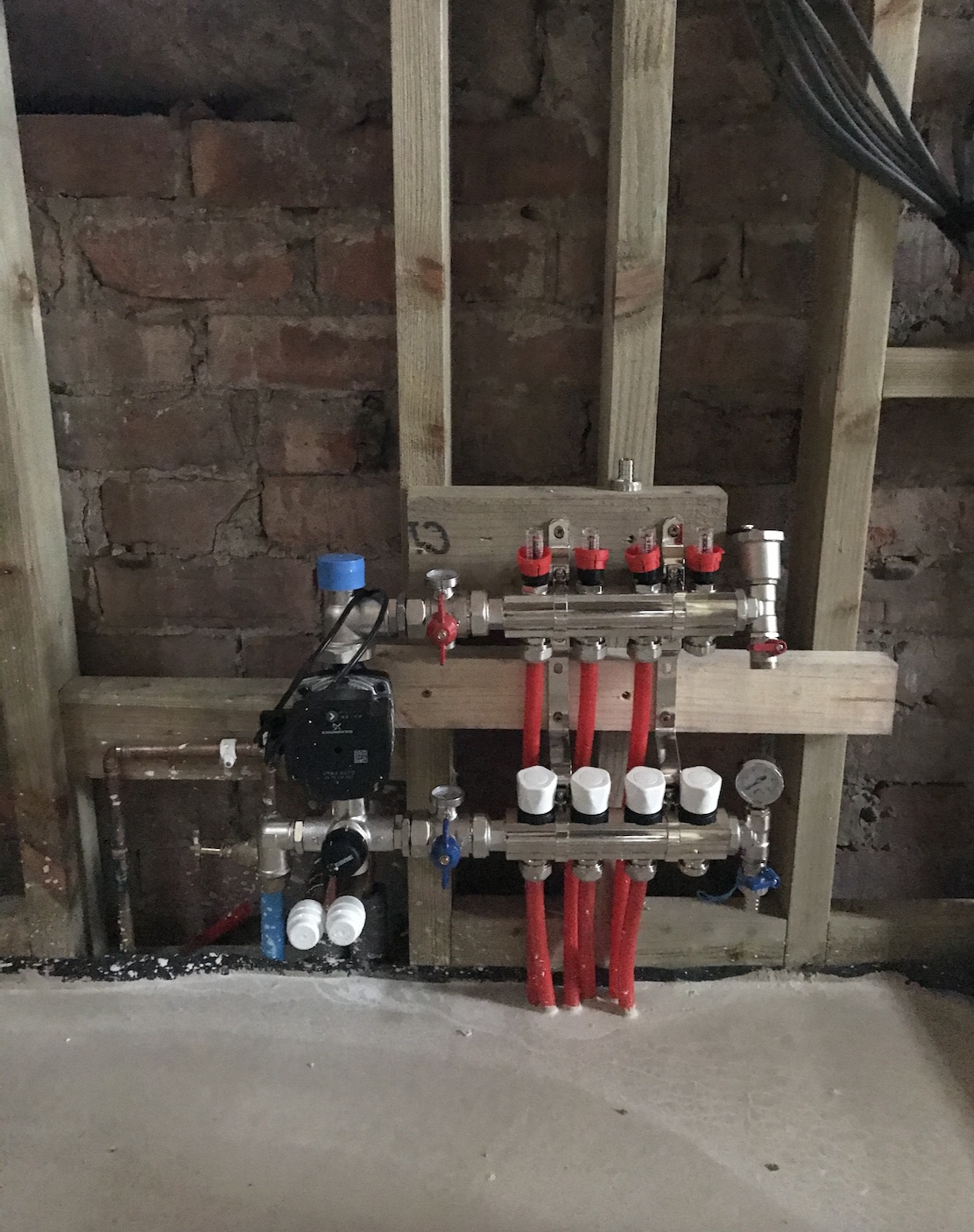 close up of the underfloor heating manifold